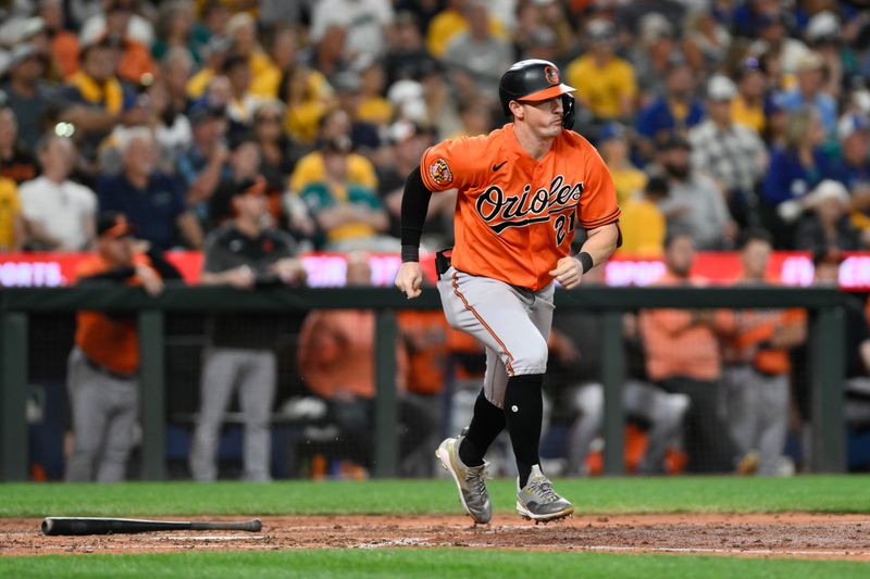 Aug 12, 2023; Seattle, Washington, USA; Baltimore Orioles left fielder Austin Hays (21) hits a single against the Seattle Mariners during the eighth inning at T-Mobile Park. Mandatory Credit: Steven Bisig-USA TODAY Sports