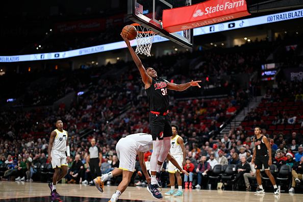 PORTLAND, OREGON - DECEMBER 14: Jabari Walker #34 of the Portland Trail Blazers shoots during the fourth quarter of the game against the Utah Jazz at Moda Center on December 14, 2023 in Portland, Oregon. The Utah Jazz won 122-114. NOTE TO USER: User expressly acknowledges and agrees that, by downloading and or using this Photograph, user is consenting to the terms and conditions of the Getty Images License Agreement. (Photo by Alika Jenner/Getty Images)