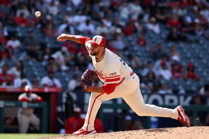 Jun 9, 2024; Anaheim, California, USA;  Los Angeles Angels relief pitcher Carlos Estevez (53) pitches during the ninth inning against the Houston Astros at Angel Stadium. Mandatory Credit: Kiyoshi Mio-USA TODAY Sports