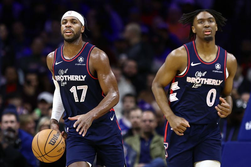 PHILADELPHIA, PENNSYLVANIA - FEBRUARY 22: Buddy Hield #17 of the Philadelphia 76ers dribbles during the first quarter against the New York Knicksat the Wells Fargo Center on February 22, 2024 in Philadelphia, Pennsylvania. (Photo by Tim Nwachukwu/Getty Images)