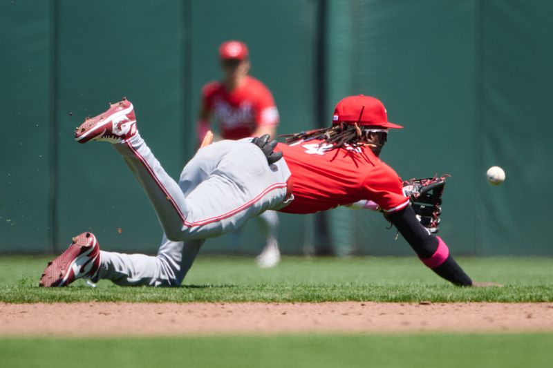 May 12, 2024; San Francisco, California, USA; Cincinnati Reds infielder Elly De La Cruz (44) dives for a ground ball against the San Francisco Giants during the fourth inning at Oracle Park. Mandatory Credit: Robert Edwards-USA TODAY Sports