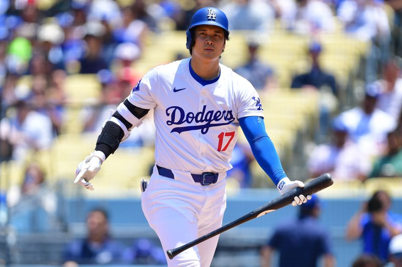 May 19, 2024; Los Angeles, California, USA; Los Angeles Dodgers designated hitter Shohei Ohtani (17) reacts after striking out against the Cincinnati Reds during the first inning at Dodger Stadium. Mandatory Credit: Gary A. Vasquez-USA TODAY Sports