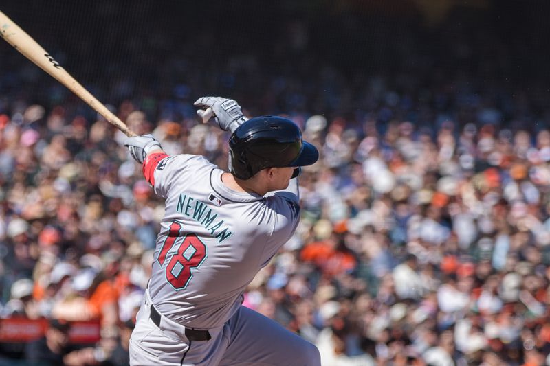 Apr 21, 2024; San Francisco, California, USA;  Arizona Diamondbacks shortstop Kevin Newman (18) hits an RBI double against the San Francisco Giants during the ninth inning at Oracle Park. Mandatory Credit: John Hefti-USA TODAY Sports