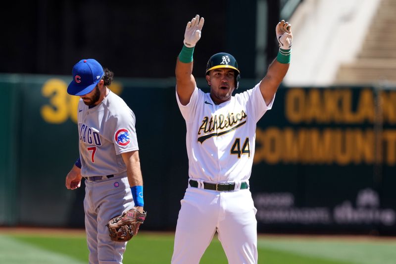 Apr 19, 2023; Oakland, California, USA; Oakland Athletics designated hitter Carlos Perez (44) reacts after hitting an RBI-double against the Chicago Cubs during the fifth inning at Oakland-Alameda County Coliseum. Mandatory Credit: Darren Yamashita-USA TODAY Sports