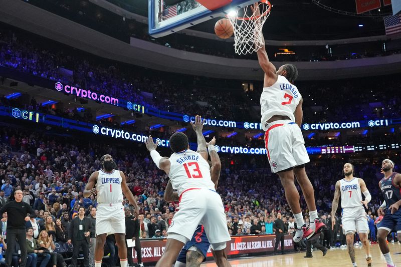 PHILADELPHIA, PA - MARCH 27: Kawhi Leonard #2 of the LA Clippers blocks the basket during the game against the Philadelphia 76ers on March 27, 2024 at the Wells Fargo Center in Philadelphia, Pennsylvania NOTE TO USER: User expressly acknowledges and agrees that, by downloading and/or using this Photograph, user is consenting to the terms and conditions of the Getty Images License Agreement. Mandatory Copyright Notice: Copyright 2024 NBAE (Photo by Jesse D. Garrabrant/NBAE via Getty Images)