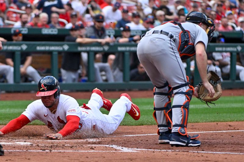 May 7, 2023; St. Louis, Missouri, USA;  St. Louis Cardinals designated hitter Willson Contreras (40) slides safely past Detroit Tigers catcher Jake Rogers (34) during the second inning at Busch Stadium. Mandatory Credit: Jeff Curry-USA TODAY Sports