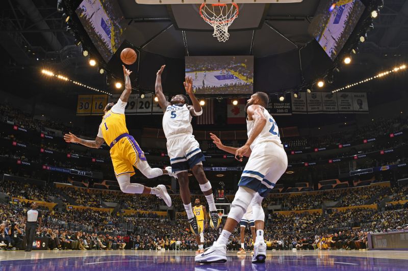 LOS ANGELES, CA - OCTOBER 22: D'Angelo Russell #1 of the Los Angeles Lakers shoots the ball during the game against the Minnesota Timberwolves on October 22, 2024 at Crypto.Com Arena in Los Angeles, California. NOTE TO USER: User expressly acknowledges and agrees that, by downloading and/or using this Photograph, user is consenting to the terms and conditions of the Getty Images License Agreement. Mandatory Copyright Notice: Copyright 2024 NBAE (Photo by Adam Pantozzi/NBAE via Getty Images)