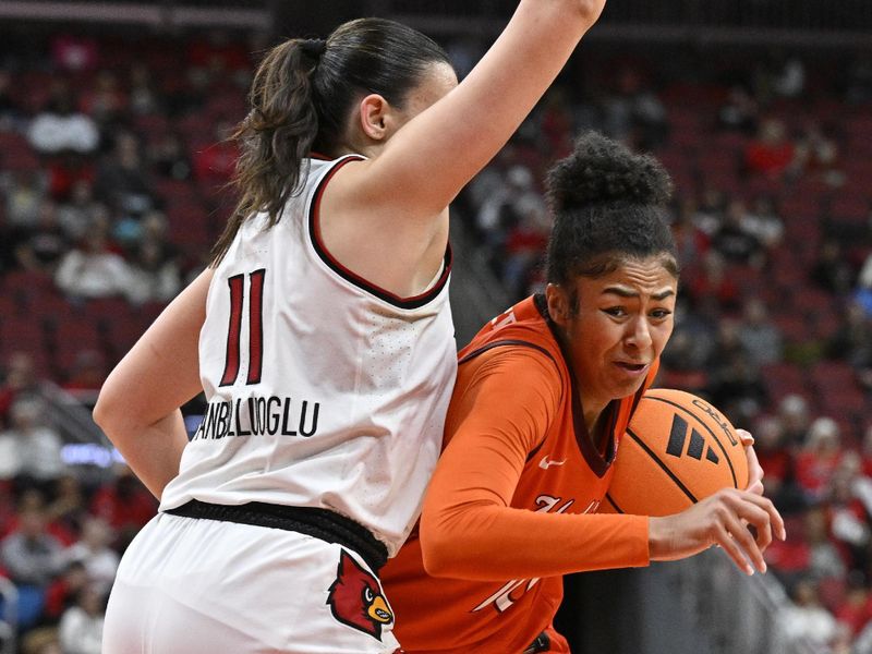 Jan 4, 2026; Louisville, Kentucky, USA;  Virginia Tech Hokies forward Carys Baker (10) drives to the basket against Louisville Cardinals forward Elif Istanbulluoglu (11) during the second half at KFC Yum! Center. Louisville defeated Virginia Tech 85-60. Mandatory Credit: Jamie Rhodes-Imagn Images