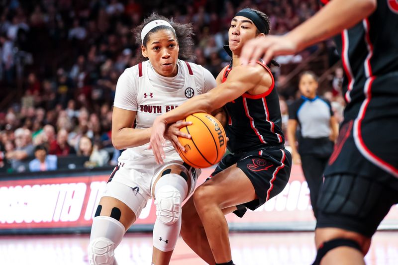 Feb 26, 2023; Columbia, South Carolina, USA; South Carolina Gamecocks guard Zia Cooke (1) is fouled by Georgia Lady Bulldogs guard Chloe Chapman (1) in the second half at Colonial Life Arena. Mandatory Credit: Jeff Blake-USA TODAY Sports