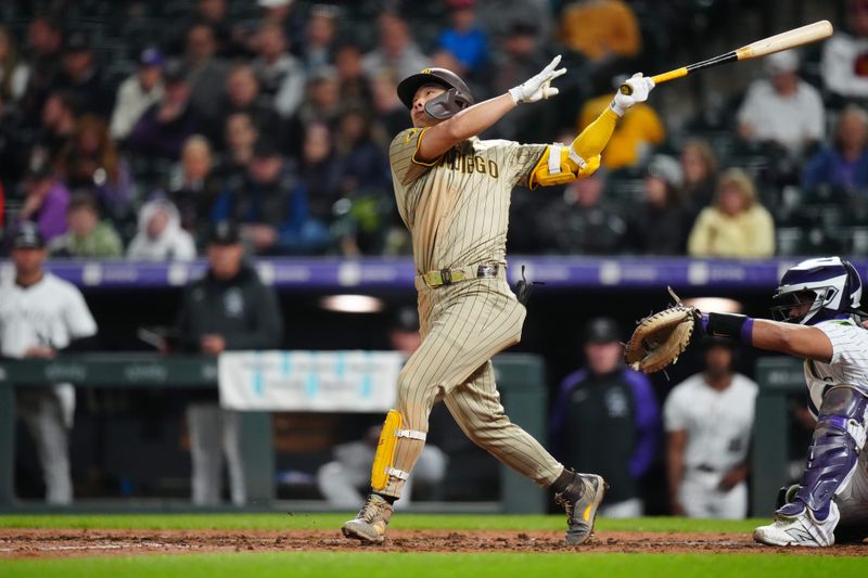 Apr 23, 2024; Denver, Colorado, USA; San Diego Padres shortstop Ha-Seong Kim (7) swings in the fifth inning against the Colorado Rockies at Coors Field. Mandatory Credit: Ron Chenoy-USA TODAY Sports