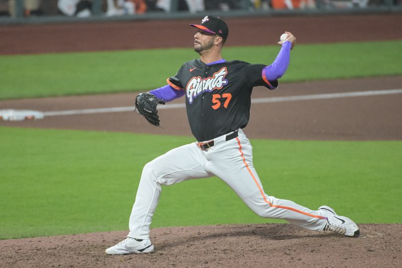 Jun 24, 2025; San Francisco, California, USA;  San Francisco Giants pitcher Joey Lucchesi (57) throws a pitch during the eighth inning of the game against the Miami Marlins at Oracle Park. Mandatory Credit: Ed Szczepanski-Imagn Images