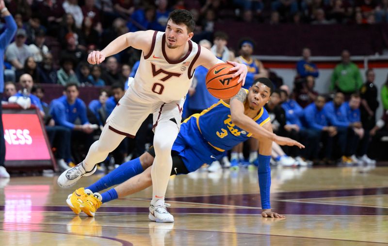 Feb 18, 2023; Blacksburg, Virginia, USA; Virginia Tech Hokies guard Hunter Cattoor (0) controls the ball against Pittsburgh Panthers guard Greg Elliott (3) in the second half at Cassell Coliseum. Mandatory Credit: Lee Luther Jr.-USA TODAY Sports