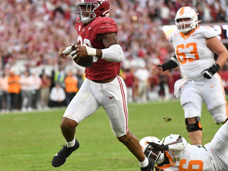 Oct 21, 2023; Tuscaloosa, Alabama, USA; Alabama Crimson Tide linebacker Jihaad Campbell (30) recovers a fumble and runs it in for a touchdown against Tennessee at Bryant-Denny Stadium. Tennessee Volunteers running back Dylan Sampson (6) makes a diving attempt at a tackle. Alabama defeated Tennessee 34-20. Mandatory Credit: Gary Cosby Jr.-USA TODAY Sports