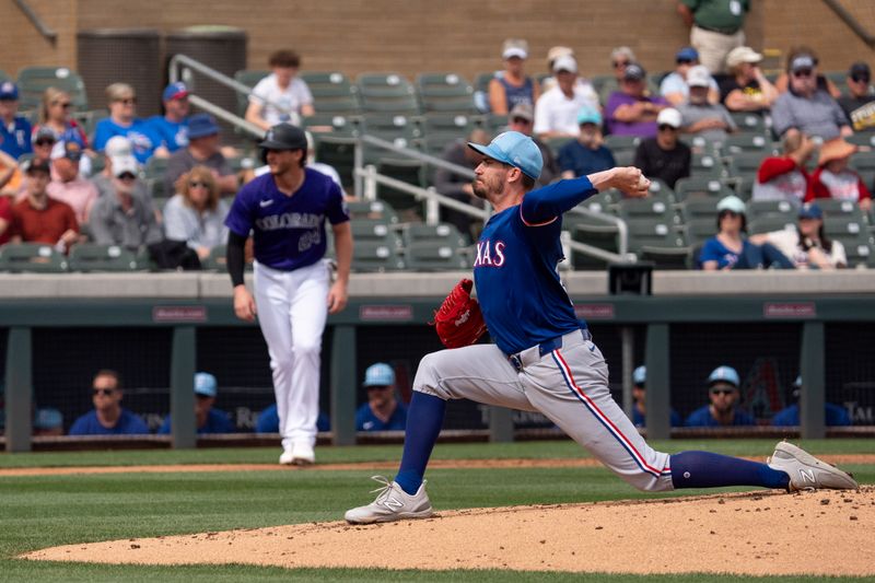 Mar 6, 2024; Salt River Pima-Maricopa, Arizona, USA; Texas Rangers starting pitcher Andrew Heaney (34) on the mound in the second during a spring training game against  the Colorado Rockies at Salt River Fields at Talking Stick. Mandatory Credit: Allan Henry-USA TODAY Sports