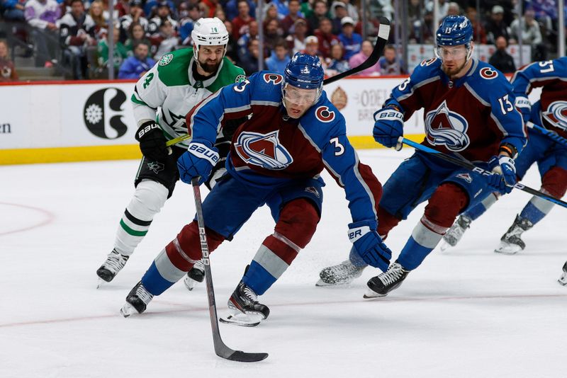 May 11, 2024; Denver, Colorado, USA; Colorado Avalanche defenseman Jack Johnson (3) controls the puck ahead of Dallas Stars left wing Jamie Benn (14) and right wing Valeri Nichushkin (13) in the third period in game three of the second round of the 2024 Stanley Cup Playoffs at Ball Arena. Mandatory Credit: Isaiah J. Downing-USA TODAY Sports