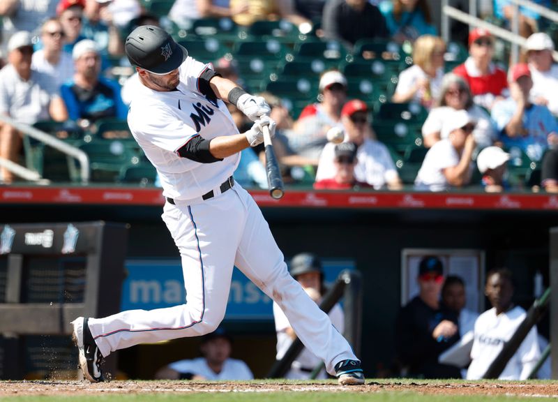 Feb 26, 2023; Jupiter, Florida, USA; Miami Marlins catcher Jacob Stallings (58) bats against the St. Louis Cardinals in the third inning at Roger Dean Stadium. Mandatory Credit: Rhona Wise-USA TODAY Sports