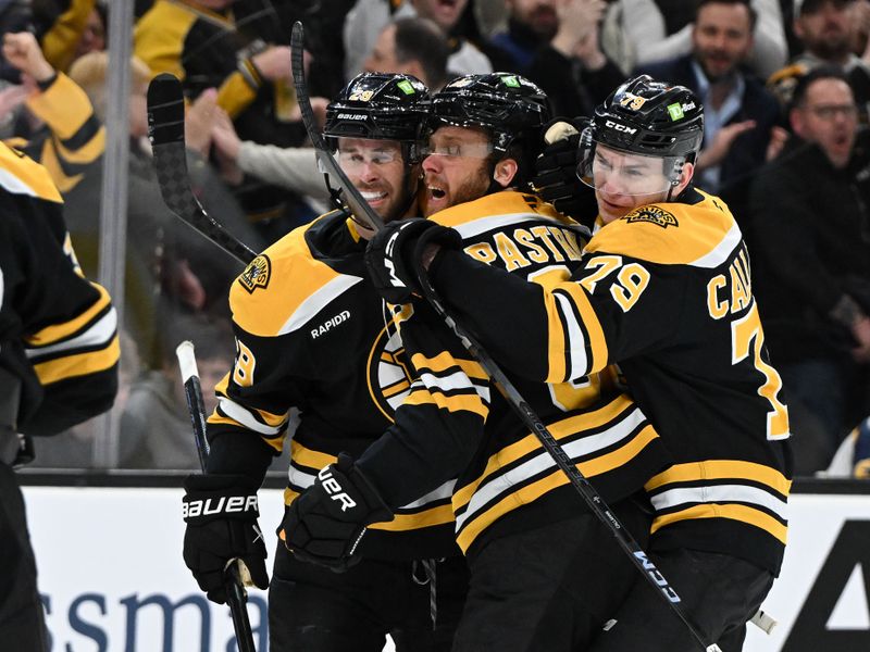 Feb 25, 2025; Boston, Massachusetts, USA; Boston Bruins right wing David Pastrnak (88) celebrates with defenseman Michael Callahan (79) and defenseman Parker Wotherspoon (29) after scoring a goal against the Toronto Maple Leafs during the third period at the TD Garden. Mandatory Credit: Brian Fluharty-Imagn Images