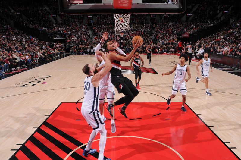 PORTLAND, OR - NOVEMBER 10: Dalano Banton #5 of the Portland Trail Blazers shoots the ball during the game against the Memphis Grizzlies on November 10, 2024 at the Moda Center Arena in Portland, Oregon. NOTE TO USER: User expressly acknowledges and agrees that, by downloading and or using this photograph, user is consenting to the terms and conditions of the Getty Images License Agreement. Mandatory Copyright Notice: Copyright 2024 NBAE (Photo by Cameron Browne/NBAE via Getty Images)