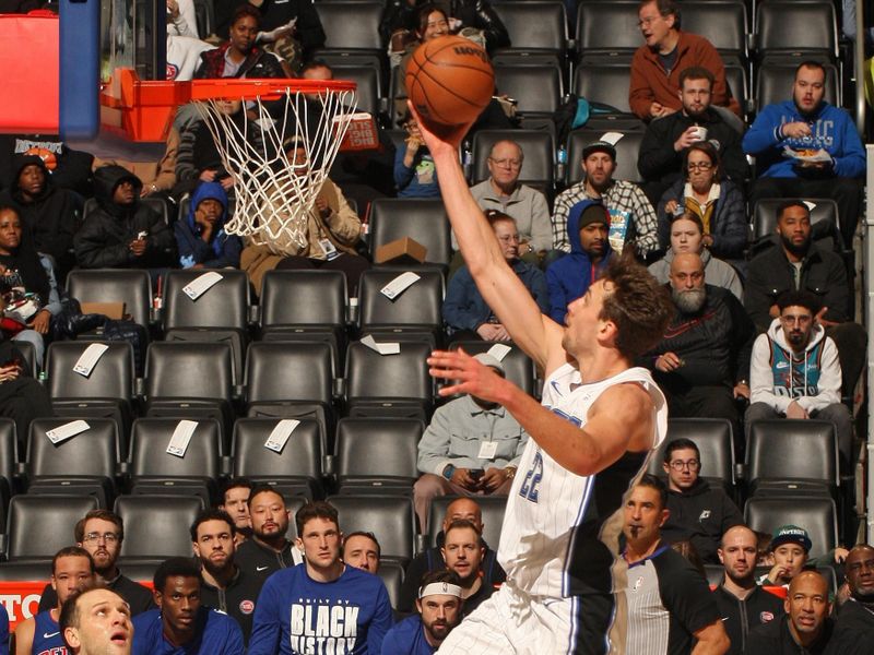 DETROIT, MI - FEBRUARY 4: Franz Wagner #22 of the Orlando Magic drives to the basket during the game against the Detroit Pistons on February 4, 2024 at Little Caesars Arena in Detroit, Michigan. NOTE TO USER: User expressly acknowledges and agrees that, by downloading and/or using this photograph, User is consenting to the terms and conditions of the Getty Images License Agreement. Mandatory Copyright Notice: Copyright 2024 NBAE (Photo by Brian Sevald/NBAE via Getty Images)