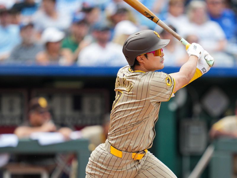 Jun 1, 2024; Kansas City, Missouri, USA; San Diego Padres shortstop Ha-Seong Kim (7) hits a three run double against the Kansas City Royals during the fourth inning at Kauffman Stadium. Mandatory Credit: Jay Biggerstaff-USA TODAY Sports