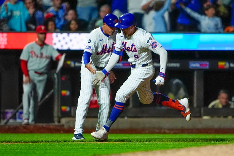 Sep 22, 2024; New York City, New York, USA; New York Mets left fielder Brandon Nimmo (9) reacts to hitting a home run as he rounds the bases against the Philadelphia Phillies during the sixth inning at Citi Field. Mandatory Credit: Gregory Fisher-Imagn Images