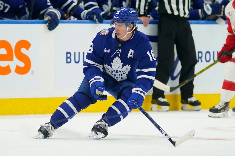 Nov 8, 2024; Toronto, Ontario, CAN; Toronto Maple Leafs forward Mitch Marner (16) skates against the Detroit Red Wings during the third period at Scotiabank Arena. Mandatory Credit: John E. Sokolowski-Imagn Images