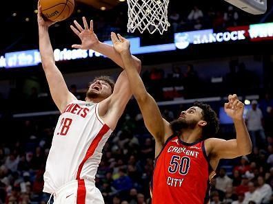 NEW ORLEANS, LOUISIANA - DECEMBER 23: Alperen Sengun #28 of the Houston Rockets shoots over Jeremiah Robinson-Earl #50 of the New Orleans Pelicans during the fourth quarter of an NBA game at Smoothie King Center on December 23, 2023 in New Orleans, Louisiana. NOTE TO USER: User expressly acknowledges and agrees that, by downloading and or using this photograph, User is consenting to the terms and conditions of the Getty Images License Agreement. (Photo by Sean Gardner/Getty Images)