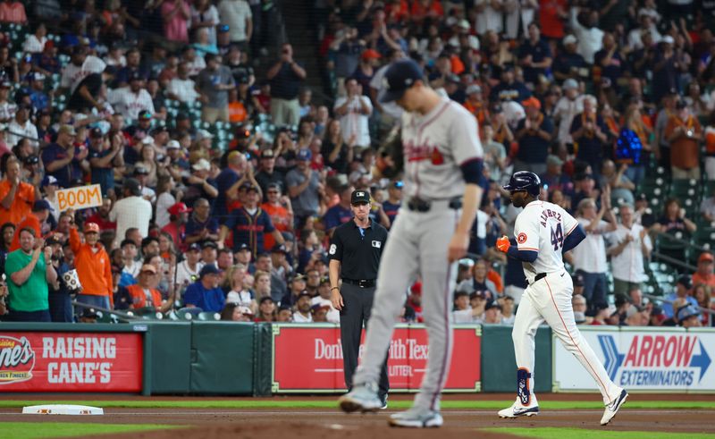Apr 17, 2024; Houston, Texas, USA; Houston Astros left fielder Yordan Alvarez (44) rounds the bases after hitting a home run against Atlanta Braves pitcher Max Fried (54) in the first inning at Minute Maid Park. Mandatory Credit: Thomas Shea-USA TODAY Sports