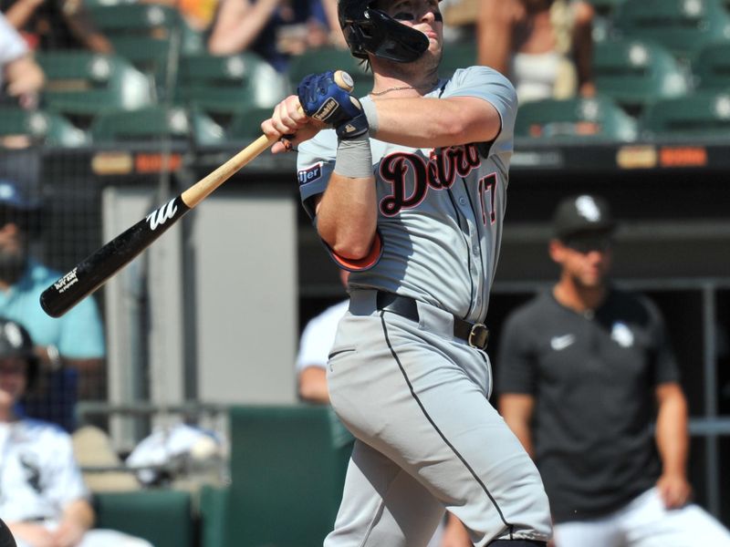 Aug 25, 2024; Chicago, Illinois, USA; Detroit Tigers second base Jace Jung (17) hits an RBI single during the fifth inning against the Chicago White Sox at Guaranteed Rate Field. Mandatory Credit: Patrick Gorski-USA TODAY Sports