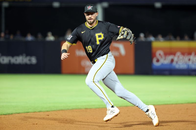 Mar 3, 2025; Tampa, Florida, USA;  Pittsburgh Pirates third base Jared Triolo (19) runs after the ball during the fifth inning against the New York Yankees at George M. Steinbrenner Field. Mandatory Credit: Kim Klement Neitzel-Imagn Images