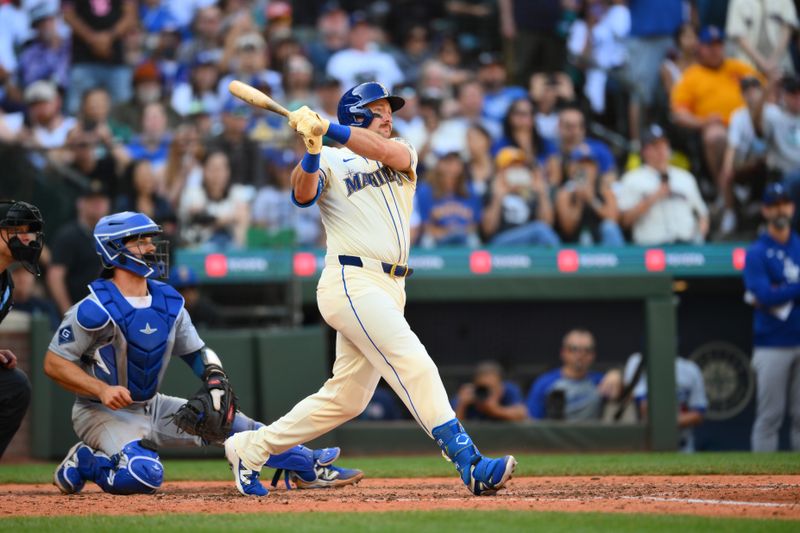 Sep 28, 2025; Seattle, Washington, USA; Seattle Mariners designated hitter Cal Raleigh (29) hits a single against the Los Angeles Dodgers during the eighth inning at T-Mobile Park. Mandatory Credit: Steven Bisig-Imagn Images