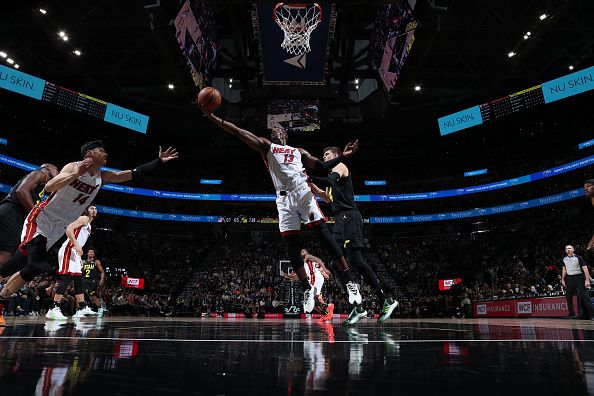 SALT LAKE CITY, UT - DECEMBER 30: Bam Adebayo #13 of the Miami Heat grabs the rebound during the game against the Utah Jazz on December 30, 2023 at Delta Center in Salt Lake City, Utah. NOTE TO USER: User expressly acknowledges and agrees that, by downloading and or using this Photograph, User is consenting to the terms and conditions of the Getty Images License Agreement. Mandatory Copyright Notice: Copyright 2023 NBAE (Photo by Melissa Majchrzak/NBAE via Getty Images)