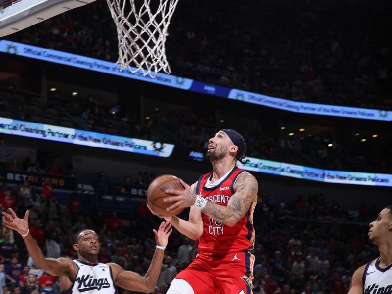 NEW ORLEANS, LA - APRIL 19:  Jose Alvarado #15 of the New Orleans Pelicans goes to the basket during the game against the Sacramento Kings during the 2024 Play-In Tournament on April 19, 2024 at the Smoothie King Center in New Orleans, Louisiana. NOTE TO USER: User expressly acknowledges and agrees that, by downloading and or using this Photograph, user is consenting to the terms and conditions of the Getty Images License Agreement. Mandatory Copyright Notice: Copyright 2024 NBAE (Photo by Jeff Haynes./NBAE via Getty Images)