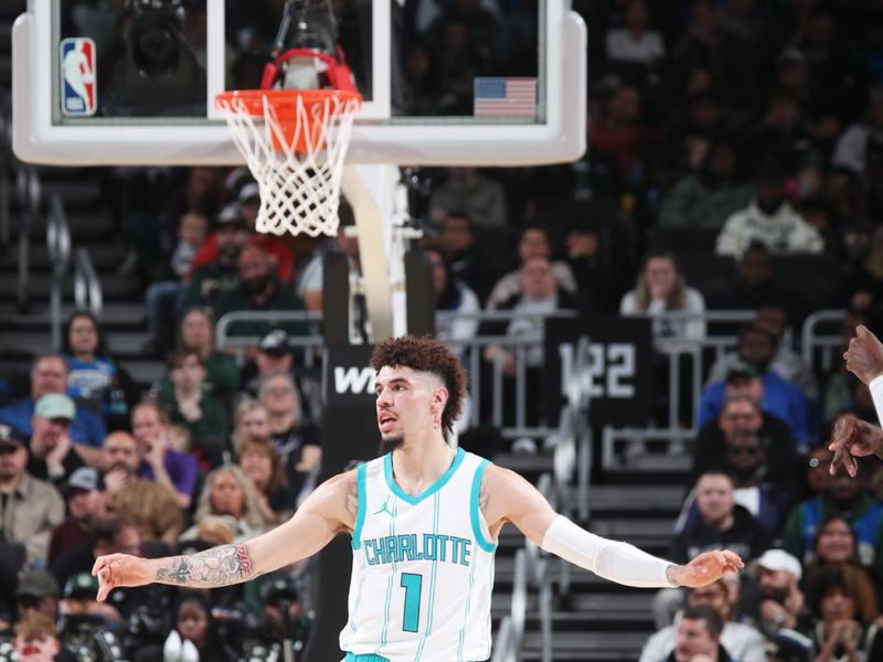 MILWAUKEE, WI - NOVEMBER 23: LaMelo Ball #1 of the Charlotte Hornets defends during the game against the Milwaukee Bucks on November 23, 2024 at the Fiserv Forum Center in Milwaukee, Wisconsin. NOTE TO USER: User expressly acknowledges and agrees that, by downloading and or using this Photograph, user is consenting to the terms and conditions of the Getty Images License Agreement. Mandatory Copyright Notice: Copyright 2024 NBAE (Photo by Gary Dineen/NBAE via Getty Images).