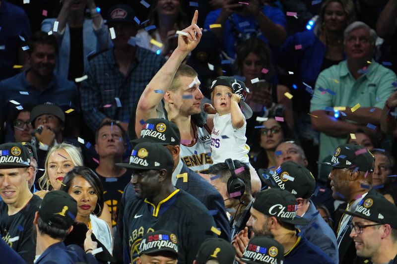 DENVER, CO - JUNE 12: Nikola Jokic #15 of the Denver Nuggets celebrates after winning Game Five of the 2023 NBA Finals on June 12, 2023 at the Ball Arena in Denver, Colorado. NOTE TO USER: User expressly acknowledges and agrees that, by downloading and/or using this Photograph, user is consenting to the terms and conditions of the Getty Images License Agreement. Mandatory Copyright Notice: Copyright 2023 NBAE (Photo by Bart Young/NBAE via Getty Images)