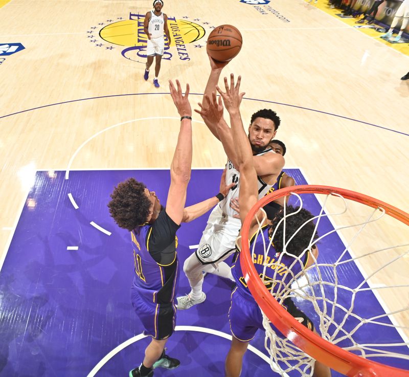 LOS ANGELES, CA - JANUARY 17: Ben Simmons #10 of the Brooklyn Nets drives to the basket during the game against the Los Angeles Lakers on January 17, 2025 at Crypto.Com Arena in Los Angeles, California. NOTE TO USER: User expressly acknowledges and agrees that, by downloading and/or using this Photograph, user is consenting to the terms and conditions of the Getty Images License Agreement. Mandatory Copyright Notice: Copyright 2025 NBAE (Photo by Adam Pantozzi/NBAE via Getty Images)