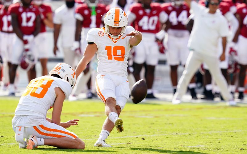 Oct 21, 2023; Tuscaloosa, Alabama, USA; Tennessee Volunteers place kicker Charles Campbell (19) kicks a field goal against the Alabama Crimson Tide during the first half at Bryant-Denny Stadium. Mandatory Credit: John David Mercer-USA TODAY Sports