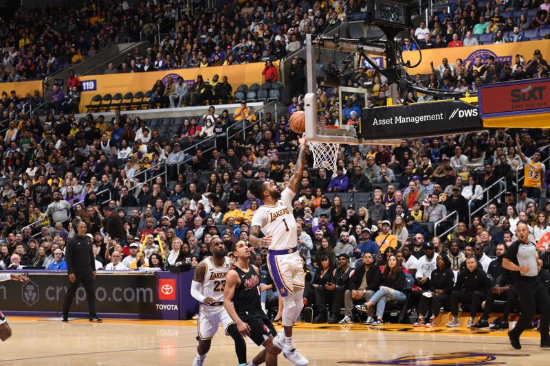 LOS ANGELES, CA - JANUARY 21:  D'Angelo Russell #1 of the Los Angeles Lakers goes to the basket during the game on January 21, 2024 at Crypto.Com Arena in Los Angeles, California. NOTE TO USER: User expressly acknowledges and agrees that, by downloading and/or using this Photograph, user is consenting to the terms and conditions of the Getty Images License Agreement. Mandatory Copyright Notice: Copyright 2024 NBAE (Photo by Juan Ocampo/NBAE via Getty Images)