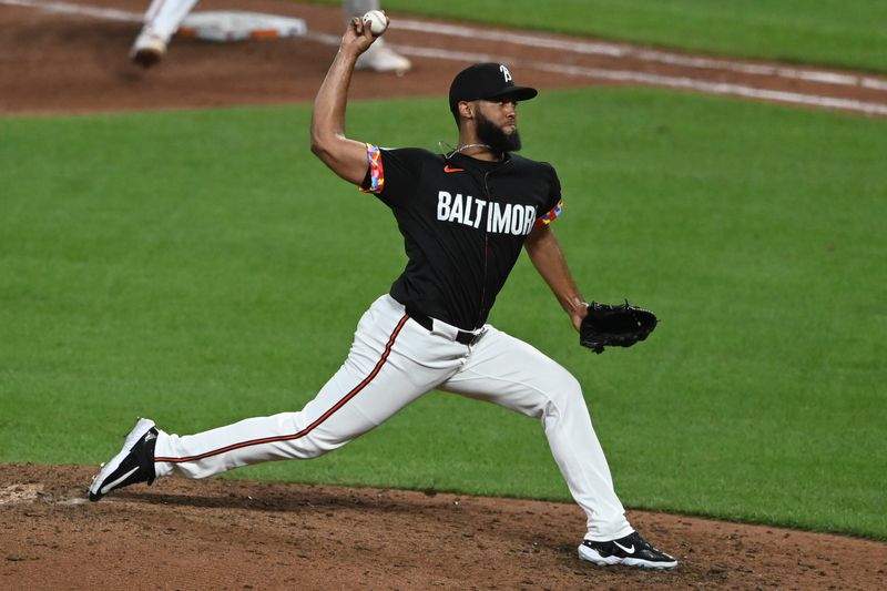 Jul 26, 2024; Baltimore, Maryland, USA;  Baltimore Orioles relief pitch Seranthony Domínguez  throws a seventh inning p[itch against the San Diego Padres at Oriole Park at Camden Yards. Mandatory Credit: Tommy Gilligan-USA TODAY Sports