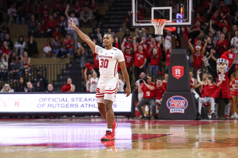 Nov 26, 2022; Piscataway, New Jersey, USA; Rutgers Scarlet Knights guard Logan Stephens (30) reacts during the second half after a Scarlet Knights basket against the Central Connecticut State Blue Devils at Jersey Mike's Arena. Mandatory Credit: Vincent Carchietta-USA TODAY Sports