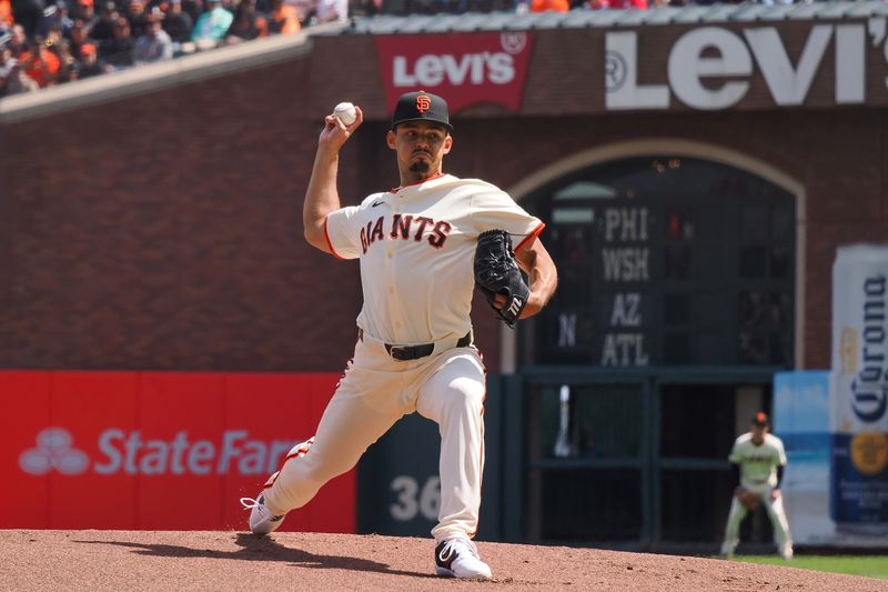 Apr 5, 2024; San Francisco, California, USA; San Francisco Giants starting pitcher Jordan Hicks (12) pitches the ball against the San Diego Padres during the first inning at Oracle Park. Mandatory Credit: Kelley L Cox-USA TODAY Sports