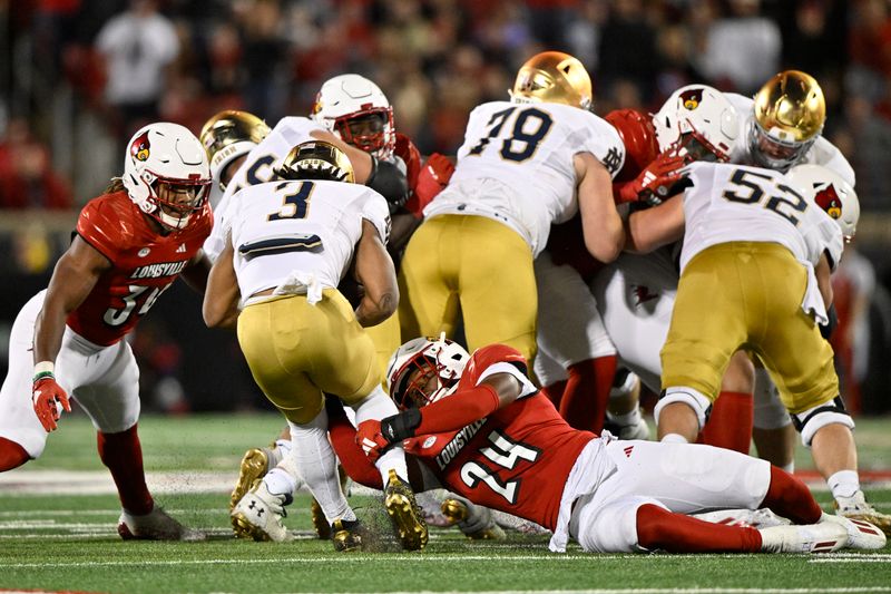 Oct 7, 2023; Louisville, Kentucky, USA; Louisville Cardinals linebacker Jaylin Alderman (24) tackles Notre Dame Fighting Irish running back Gi'Bran Payne (3) during the second half at L&N Federal Credit Union Stadium. Louisville defeated Notre Dame 33-20. Mandatory Credit: Jamie Rhodes-USA TODAY Sports