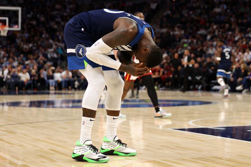 MINNEAPOLIS, MINNESOTA - NOVEMBER 10: Julius Randle #30 of the Minnesota Timberwolves reacts to a turnover in the third quarter against the Miami Heat at Target Center on November 10, 2024 in Minneapolis, Minnesota. The Heat defeated the Timberwolves 95-94. NOTE TO USER: User expressly acknowledges and agrees that, by downloading and or using this photograph, User is consenting to the terms and conditions of the Getty Images License Agreement. (Photo by David Berding/Getty Images)