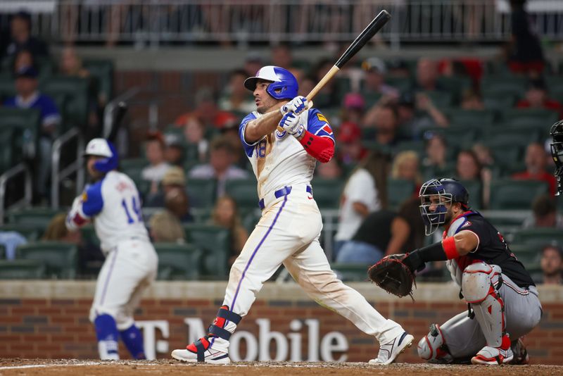 Aug 24, 2024; Atlanta, Georgia, USA; Atlanta Braves right fielder Ramon Laureano (18) hits a home run against the Washington Nationals in the eighth inning at Truist Park. Mandatory Credit: Brett Davis-USA TODAY Sports