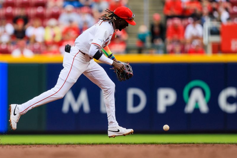 May 29, 2024; Cincinnati, Ohio, USA; Cincinnati Reds shortstop Elly De La Cruz (44) attempts to ground the ball hit by St. Louis Cardinals shortstop Masyn Winn (not pictured) in the third inning at Great American Ball Park. Mandatory Credit: Katie Stratman-USA TODAY Sports