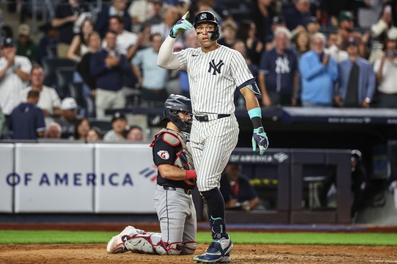 Aug 21, 2024; Bronx, New York, USA;  New York Yankees center fielder Aaron Judge (99) gestures after hitting a solo home run in the seventh inning against the Cleveland Guardians at Yankee Stadium. Mandatory Credit: Wendell Cruz-USA TODAY Sports