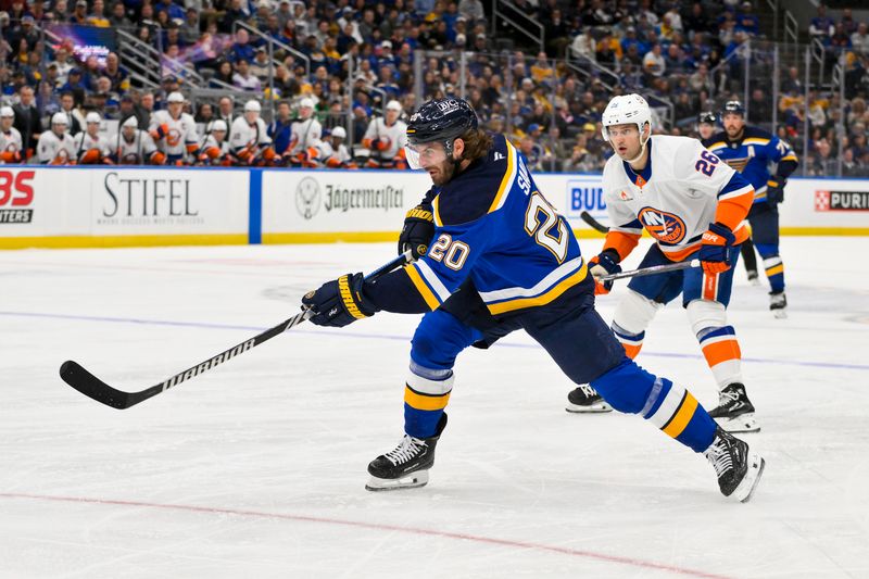 Oct 17, 2024; St. Louis, Missouri, USA;  St. Louis Blues left wing Brandon Saad (20) shoots against the New York Islanders during the second period at Enterprise Center. Mandatory Credit: Jeff Curry-Imagn Images