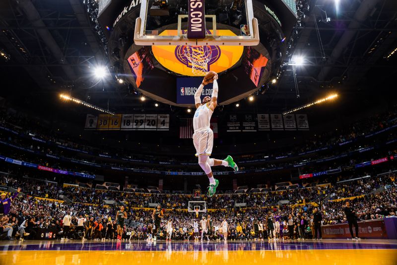 LOS ANGELES, CA - DECEMBER 13: Russell Westbrook #0 of the Los Angeles Lakers dunks the ball during the game against the Boston Celtics on December 13, 2022 at Crypto.Com Arena in Los Angeles, California. NOTE TO USER: User expressly acknowledges and agrees that, by downloading and/or using this Photograph, user is consenting to the terms and conditions of the Getty Images License Agreement. Mandatory Copyright Notice: Copyright 2022 NBAE (Photo by Andrew D. Bernstein/NBAE via Getty Images)