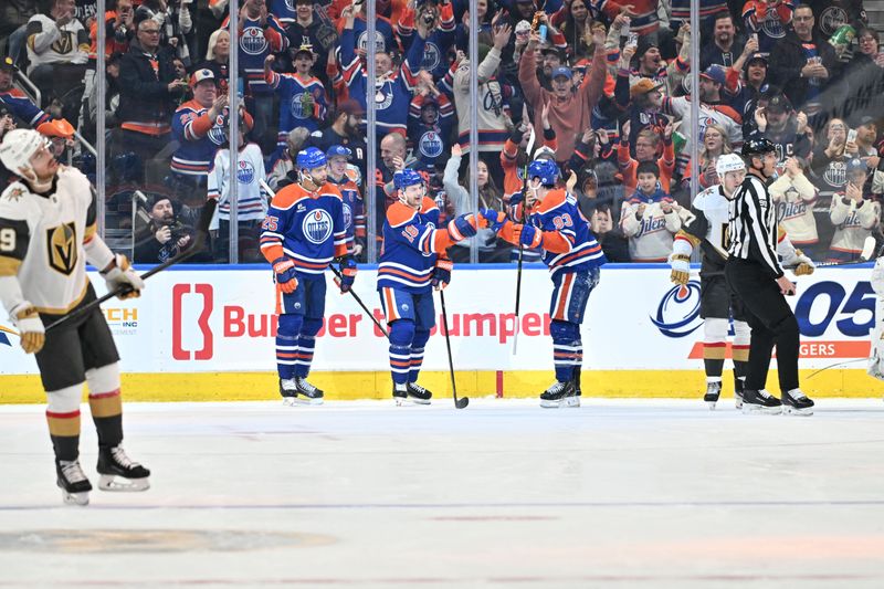 Dec 21, 2025; Edmonton, Alberta, CAN; Edmonton Oilers defenseman Darnell Nurse (25) with Oilers left wing Zach Hyman (18) and Oilers center Ryan Nugent-Hopkins (93) celebrate a goal on Vegas Golden Knights goalie Carter Hart (79) during the second period at Rogers Place. Mandatory Credit: Walter Tychnowicz-Imagn Images