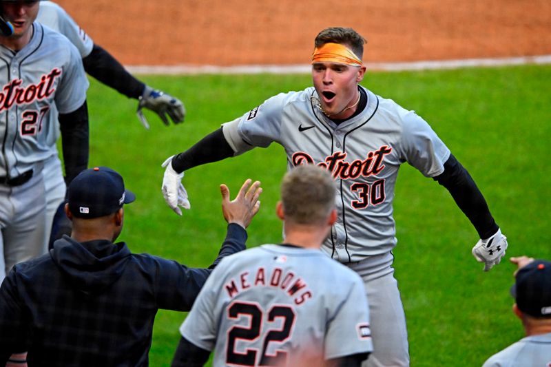 Oct 7, 2024; Cleveland, Ohio, USA; Detroit Tigers outfielder Kerry Carpenter (30) celebrates after hitting a three run home run during the ninth inning against the Cleveland Guardians during game two of the ALDS for the 2024 MLB Playoffs at Progressive Field. Mandatory Credit: David Richard-Imagn Images